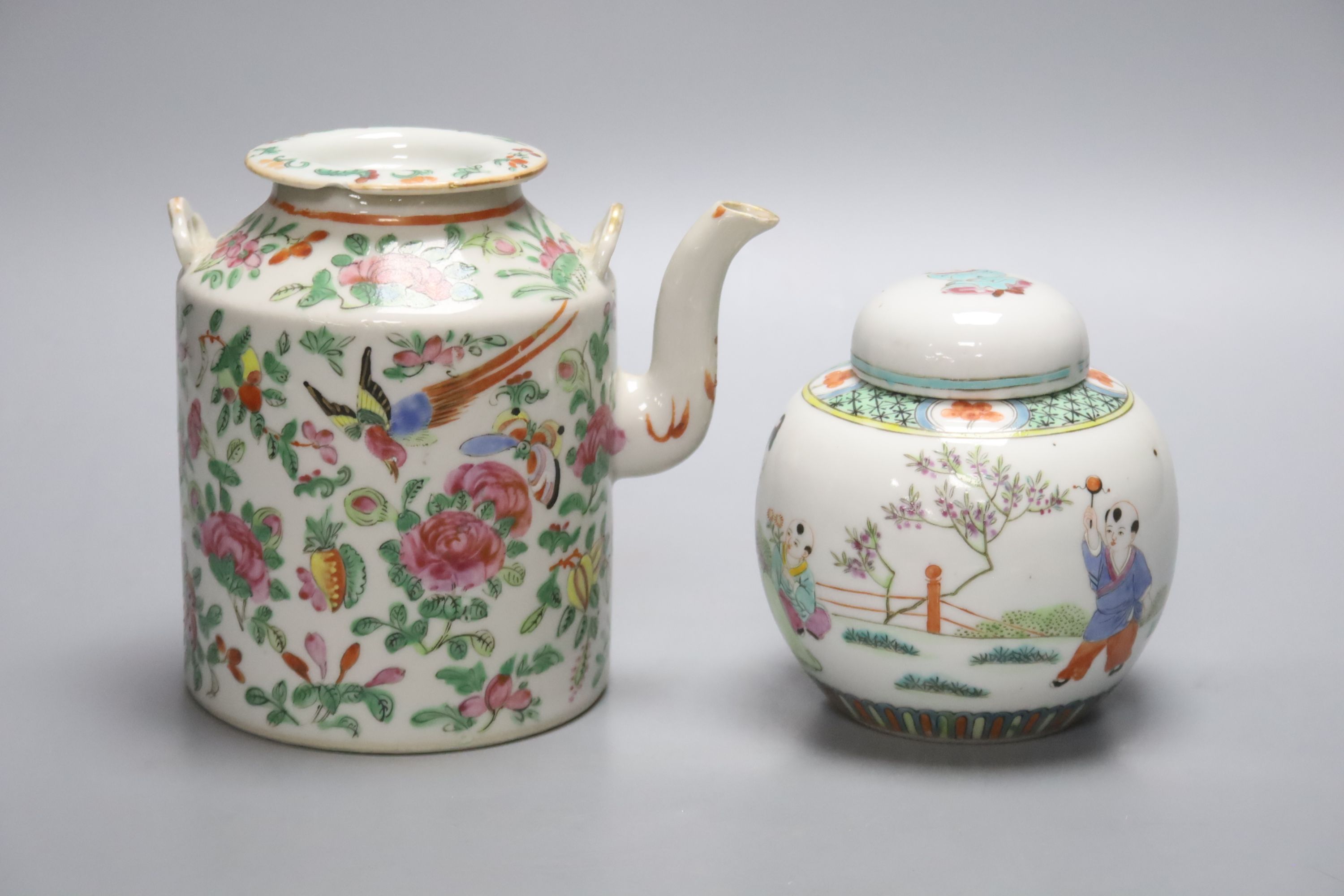 A Chinese famille rose tea pot and a similar jar and cover, tallest 14cm